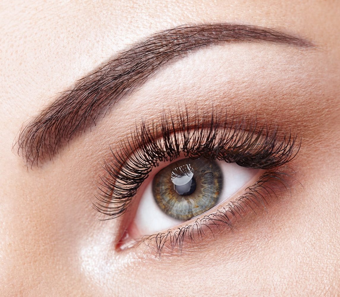 Female eye with long false eyelashes